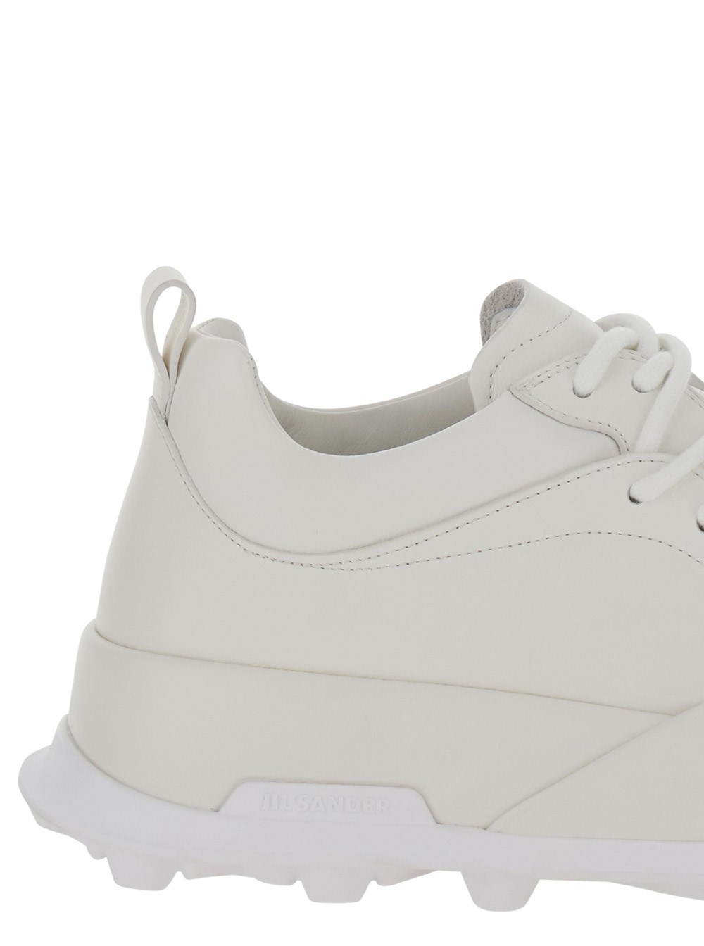 Jil sander 'orb' white low top sneakers with cleated sole in